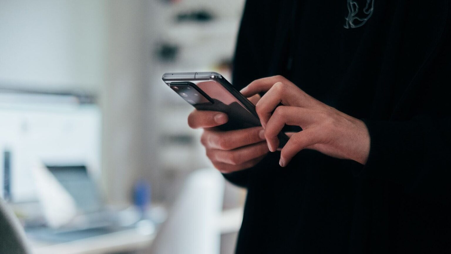 Person reading an email on their phone